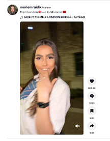 A still from a TikTok video of a teenage girl wearing a school uniform and striking a highly sexualized pose.