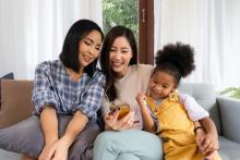 Family looking at cellphone